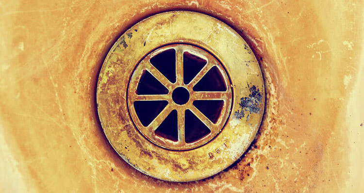 Liquiflo-small-bigstock-an-old-sink-drain-with-rust-to-84748379