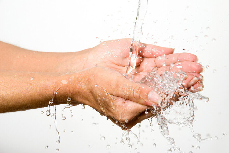 bigstock-Water-in-palms-of-hands-25970003