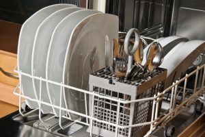 Dishwasher with glasses and dishes
